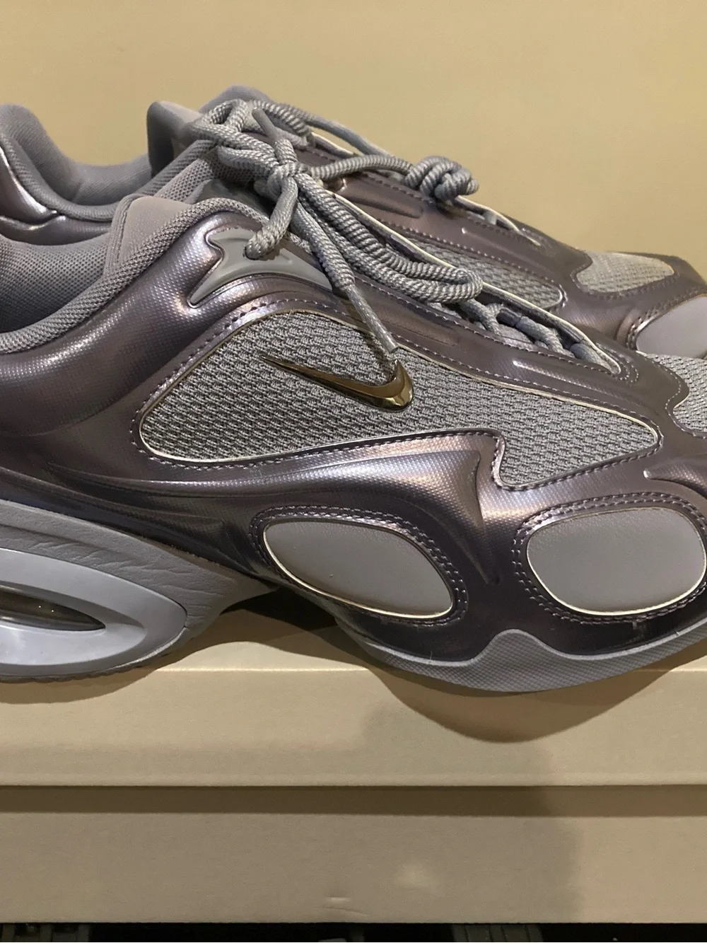 Nike Women’s Metallic Silver and Grey Runner Sneakers